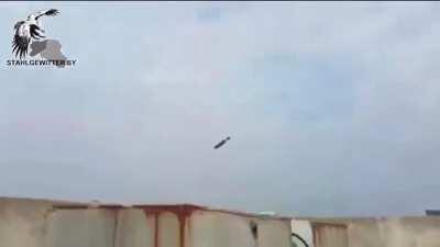 Elephant Rocket Flying Low Over Rooftop Position of Iraq's E.R.D. Forces