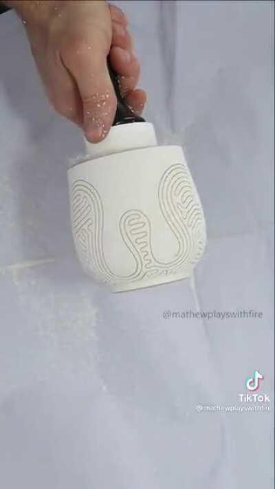 Peeling off a single line of tape (from @matthewplayswithfire)