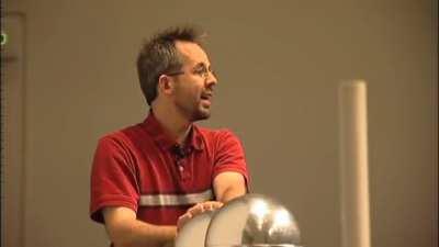 A demonstration of the way electrons travel from a high voltage to low voltage using Van de Graaff generators