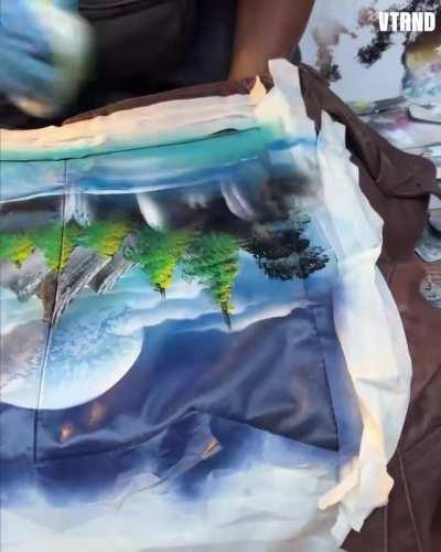 Street artist in Rome turns vintage jacket in to a masterpiece