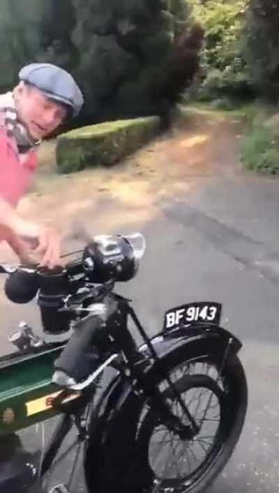 Lighting the carbide lamps on a BSA motorcycle from the 1920s