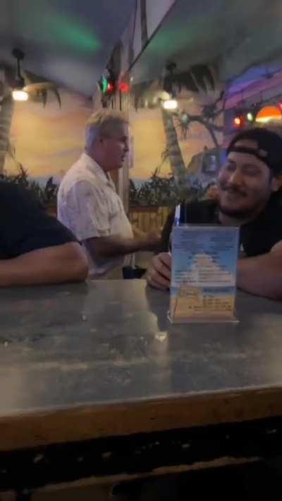 To fight a guy at the bar 