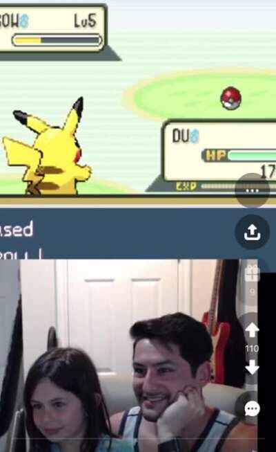 A young girl playing Pokemon with her dad for the first time and catching her first Pokemon