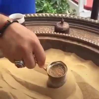 Turkish coffee on hot sand