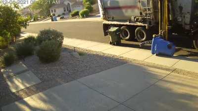 Garbage truck takes its anger out on my recycling bin