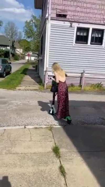 Scootin' in a sundress.