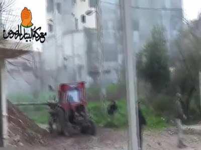 AA gun pulled by a tractor used to target Syrian Army positions near Wadi Deif - 2/19/2013