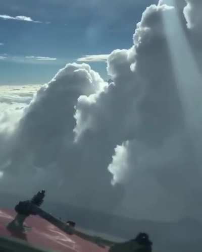 Flying through a gap in the clouds