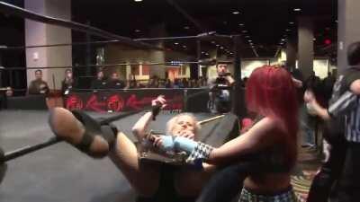 Veda Scott rings the bell on Candice LeRae