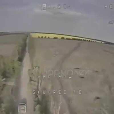 Russian FPV drone hitting multiple ukrainian vehicles in the zone of SMO