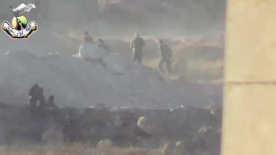 Opposition fighters storm a pair of Syrian checkpoints near the Wadi Deif Army Base - July 2014