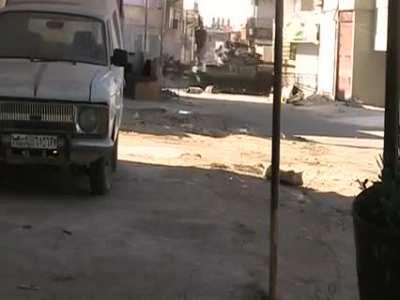 Free Syrian army blow up SAA tank with an IED. Daraa, Syria July 2012.