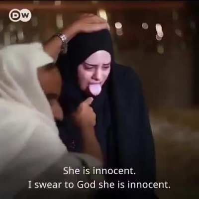 An Egyptian woman accused of stealing is forced to lick a red-hot metal plate to prove her innocence