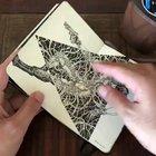 An Artist showing off their sketchbook