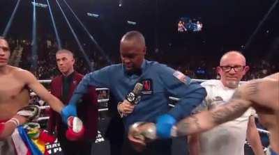 To force two boxer who genuinely hate each other to touch gloves