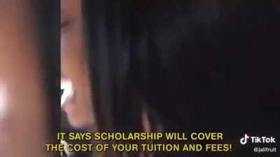 This girl finding out she got a scholarship to college