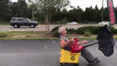 What do you get when you combine a Pasco janitor, a leaf blower, umbrella, and a mop bucket?