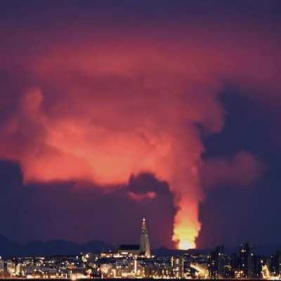 Eruption of Fagradalsfjall volcano seen from Iceland's capital, Reykjavík