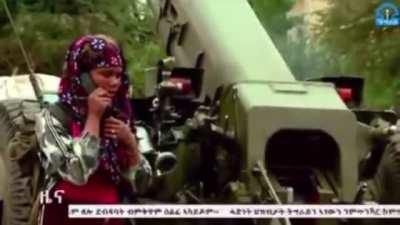 Footage showing a Tigray Defense Forces (TDF) fighter talking to infantry forces over a radio before firing an artillery gun at Ethiopian government positions