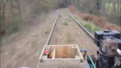 Guy makes a homemade motorized trolley for 20km of rail tracks that has been abandoned for over 10 years