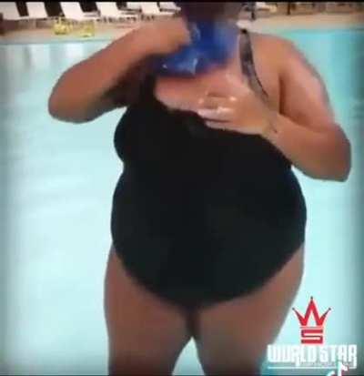 Woman takes a bath at the public pool and 