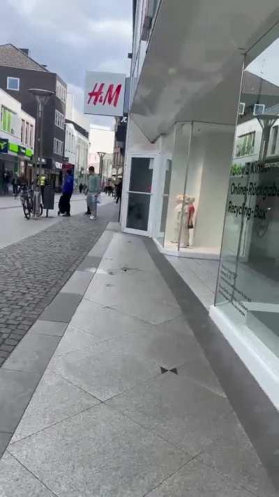 Ordnungsamt chases lightly dressed Dude, in Krefeld Germany.