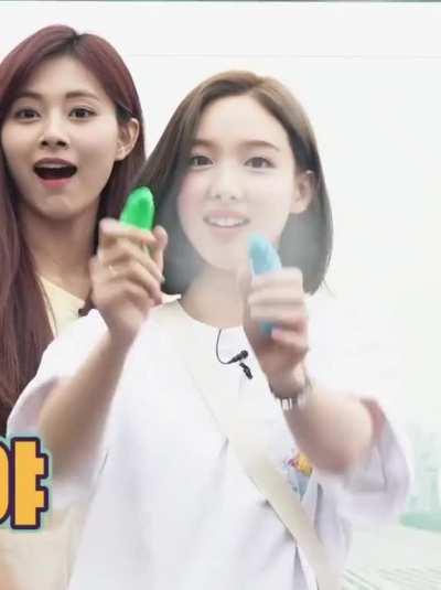 Cutie Nayeon is shocked after spraying with the water guns (feat. Tzuyu)