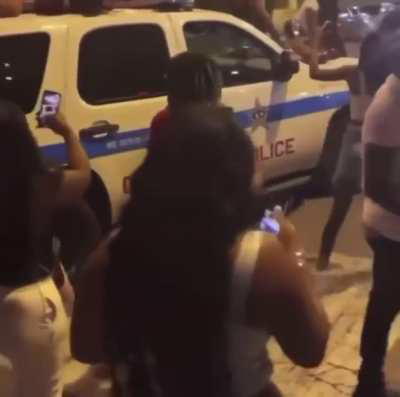 Twerking on a cop car..