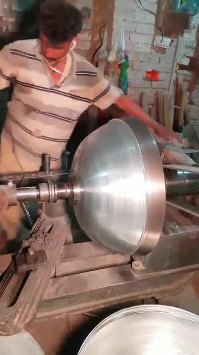 This guy making a bowl.