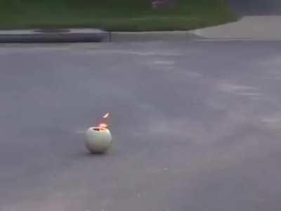 What happens when you smash a melon on fire filled with gasoline?