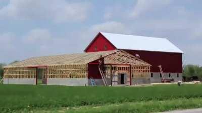 Amish building a house in a day.