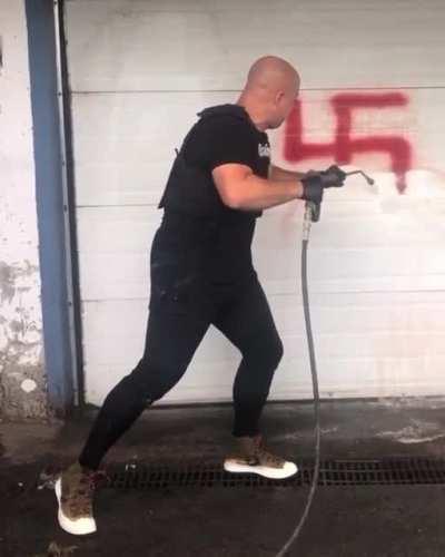 This guy is Erasing Hate all over the world by removing racist graffiti using a power washer, and it's incredibly satisfying in more ways than one.