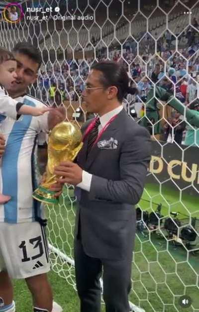 “Salt Bae” prying the World Cup trophy from Cristian Romero and his son.