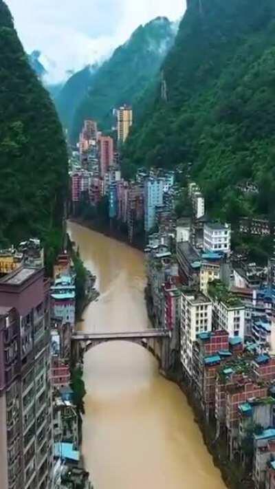 Yanjin county, Yunnan is the narrowest town in China, nestled between mountains and the Guanhe River.