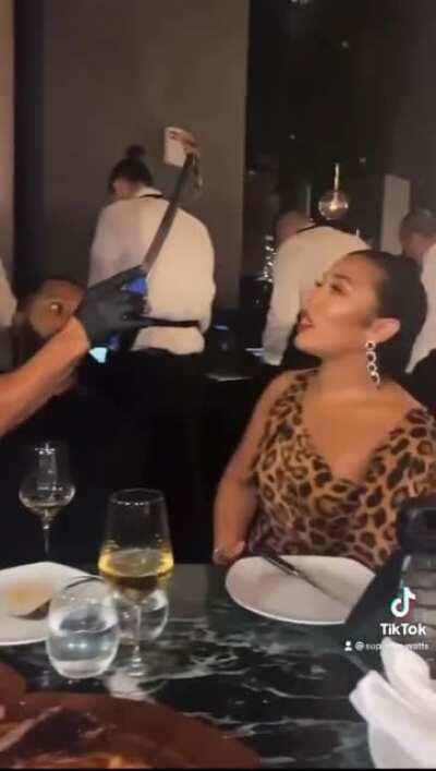 A man takes his girl to Salt Bae's restaurant and they are served up some meat