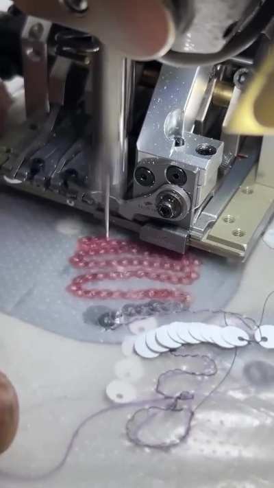 A sewing machine that can apply sequins or beads