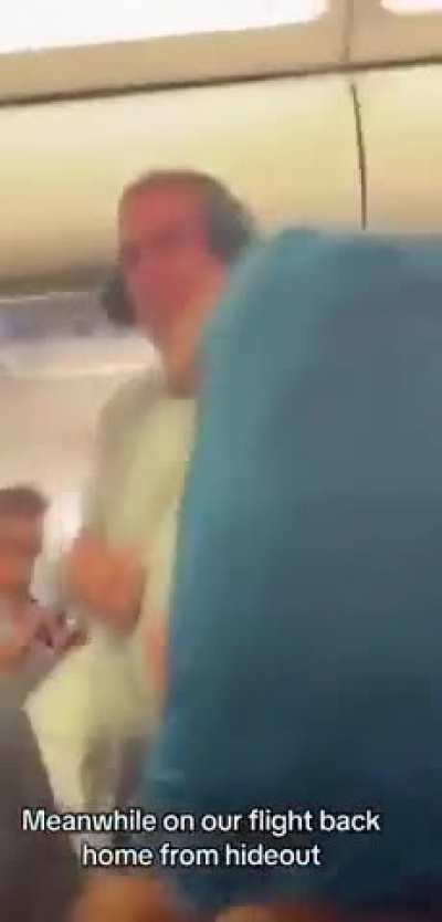 Man tried to open the door on a crowded Ryanair plane flying from Zadar in Croatia. When he ran to the door, two young men jumped on him and threw him to the floor.