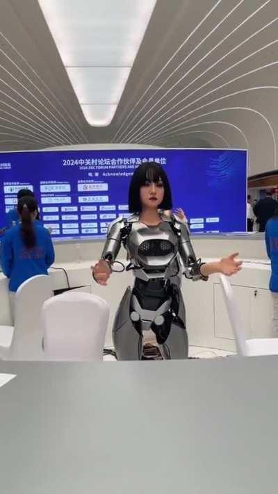 This company`s stand in a robot fair in China. Keep it civil, guys. she said she was born in 2021