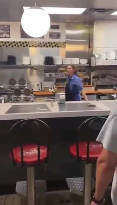 Chair catch by a Waffle House employee, she is THE main character with that catch 😂