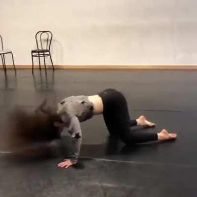 Dancer using her forefeet to get up.