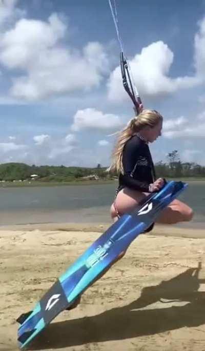 Kiteboarder doing a darkslide