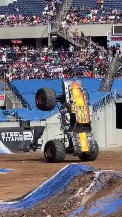 The way this monster truck balanced and did a flip.