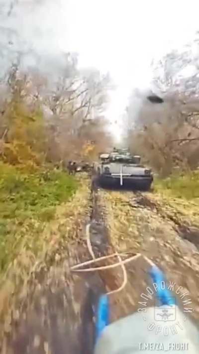 RU POV: FPV drone sneaks up on a group of Ukrainian soldiers and a Bradley, Kursk oblast