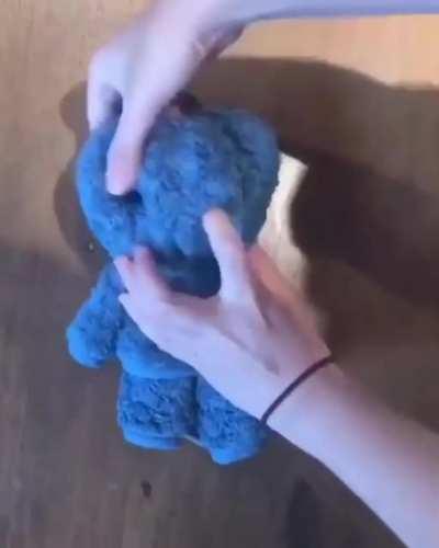 Making a teddy bear out of a wash cloth/towel.