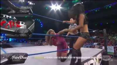 ODB has Gail Kim land on her lifted arm, crotch first