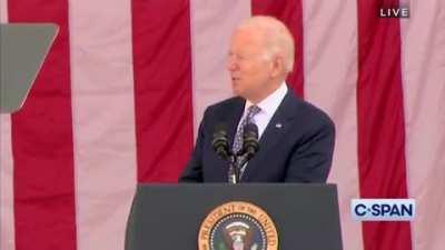 Biden tells a story about pitcher Satchel Paige, referring to him as &quot;the great negro at the time.&quot;