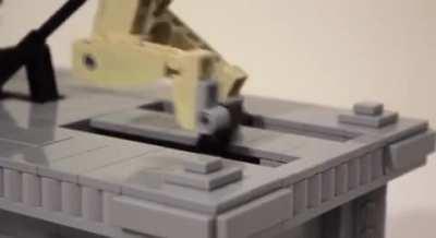 LEGO kinetic sculpture of Sisyphus pushing his boulder