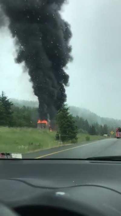 Burning semi on I-90 W near Snoqualmie, WA. Video taken this morning.