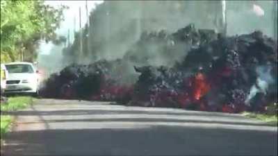 Lava consumes car