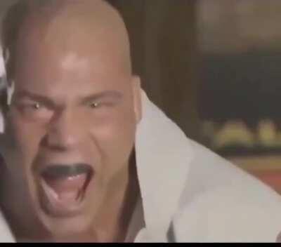 Kurt Angle evilly laughing